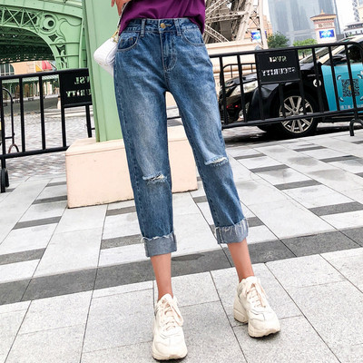 Női farmer kék színben, szakadt motívumokkal 7/8 modell