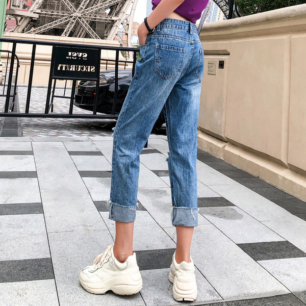 Női farmer kék színben, szakadt motívumokkal 7/8 modell