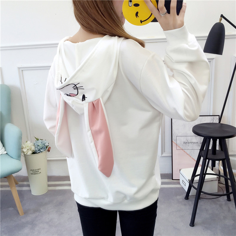 Modern női pulóver 3D elemekkel fehér és rózsaszín színben