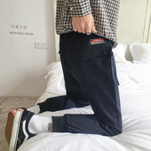 Pantaloni moderni pentru barbati cu embleme in doua culori