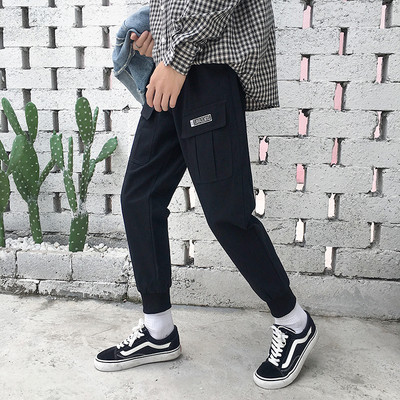 Pantaloni moderni pentru barbati cu embleme in doua culori