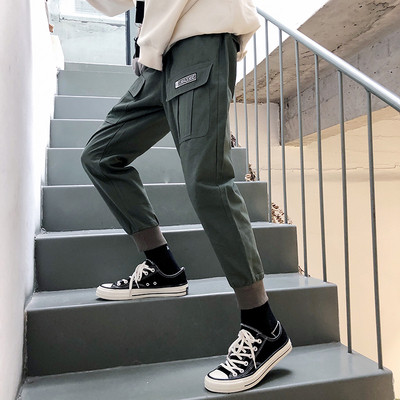 Pantaloni moderni pentru barbati cu embleme in doua culori