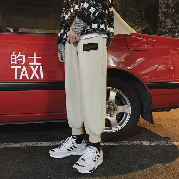 Alkalmi férfi nadrág két színben emblémával