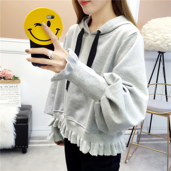 Női alkalmi pulóver kapucnival, világos színekben