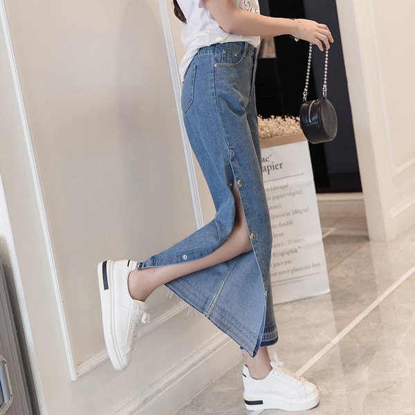 Új modell Női farmer magas derékkal és hasítékkal