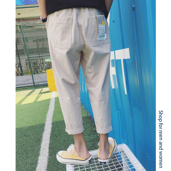 Modern széles férfi nadrág két színben emblémával