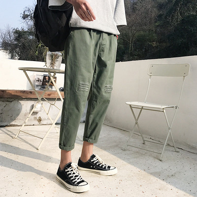 Naprakész férfi nadrág szakadt motívumokkal, négy színben