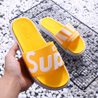 Aktuális férfi és női papucsok több színben felirattal