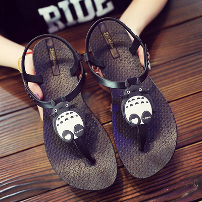 Női gumiszandál fekete színben, díszítéssel