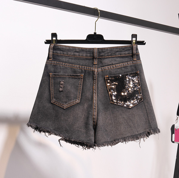 НОВО Модерни дамски къси дънки с пайети в тъмен цвят 