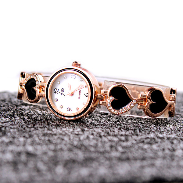 Fém szíjjal és kövekkel ellátott női karóra két színben