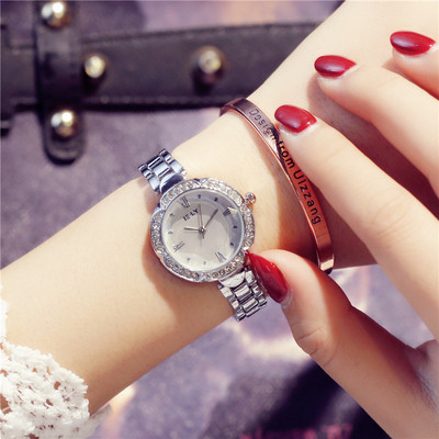 Fém szíjjal és kövekkel ellátott női karóra négy színben