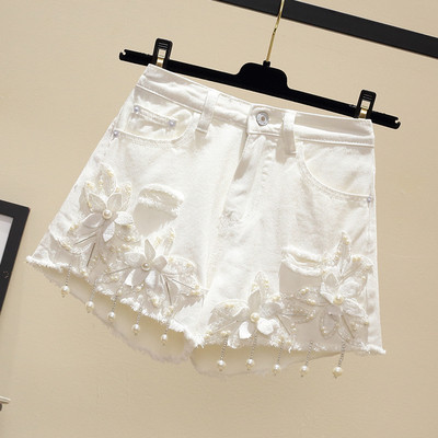 Γυναικεία σορτς σε δύο χρώματα με φυτικά μοτίβα