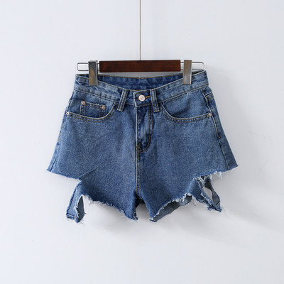 Актуални дамски дънкови панталони с разкъсани мотиви