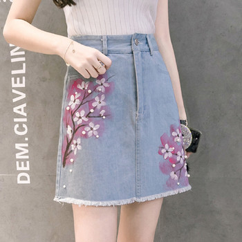 Női modern farmerszoknya virágos motívumokkal, világos színben