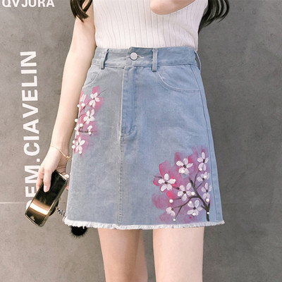  Γυναικεία trendy denim φούστα με floral μοτίβα σε ανοιχτό χρώμα