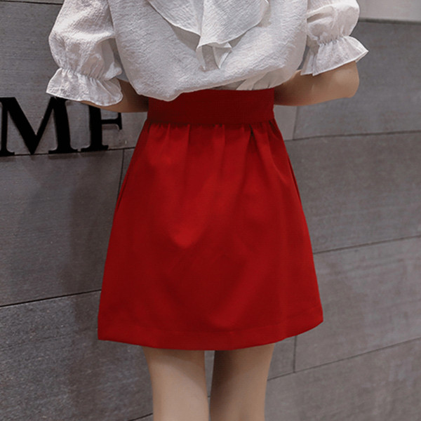 Stílusos női szoknya két színben, magas derékkal és zsebekkel