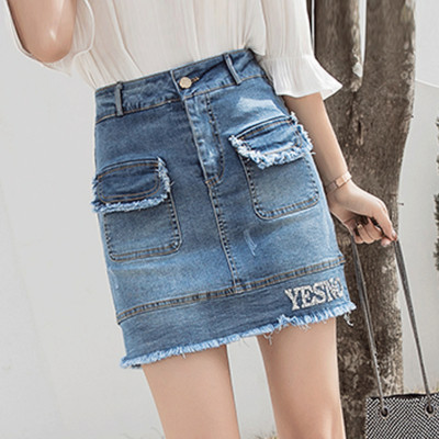 Aktuális női farmerszoknya, zsebekkel