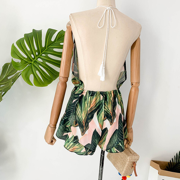 Női rövid jumpsuit csupasz háttal