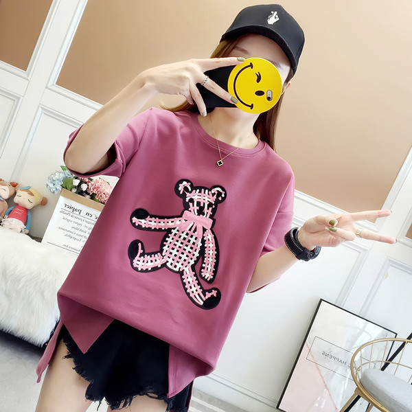 Μοντέρνα γυναικεία μπλούζα σε δύο χρώματα με εφαρμογές και κορδέλα