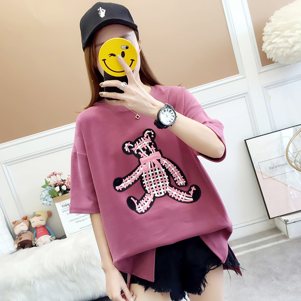 Μοντέρνα γυναικεία μπλούζα σε δύο χρώματα με εφαρμογές και κορδέλα