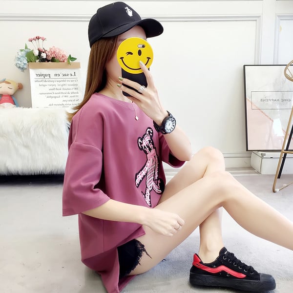 Μοντέρνα γυναικεία μπλούζα σε δύο χρώματα με εφαρμογές και κορδέλα