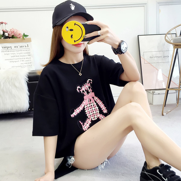 Μοντέρνα γυναικεία μπλούζα σε δύο χρώματα με εφαρμογές και κορδέλα