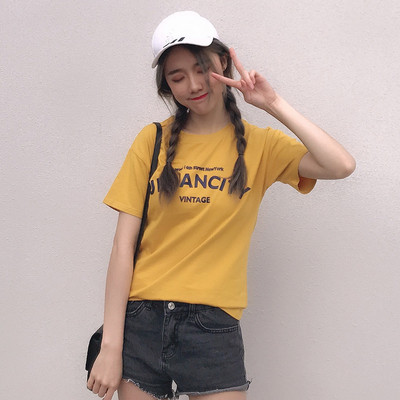 Női alkalmi póló fehér és sárga színben, felirattal