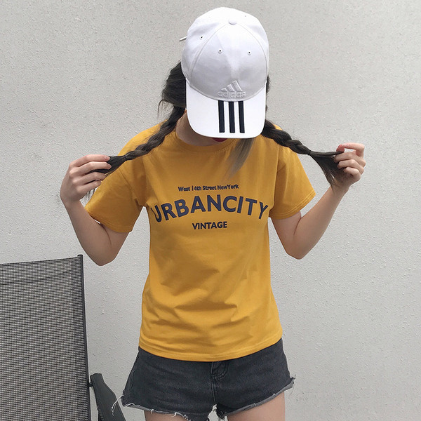 Női alkalmi póló fehér és sárga színben, felirattal