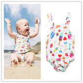 Modern, fehér színű, mintás gyermek teljes fürdőruha