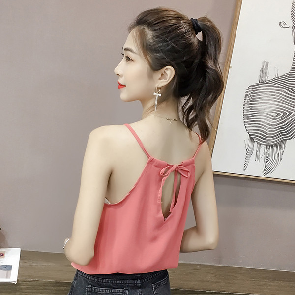 Női topikus felső vékony pántokkal, négy színben