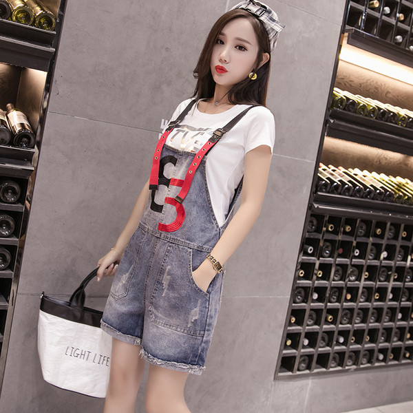 Modern női overál színes pántokkal, két modellben