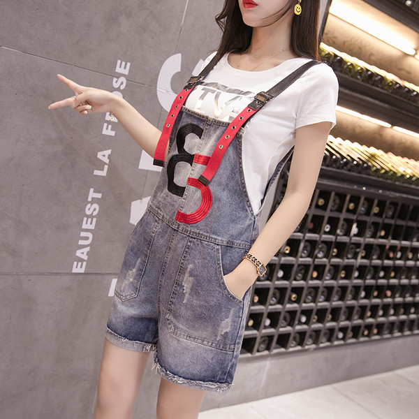 Modern női overál színes pántokkal, két modellben