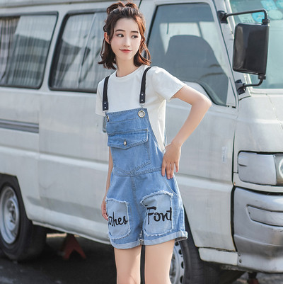 Modern női overál két modellben felirattal