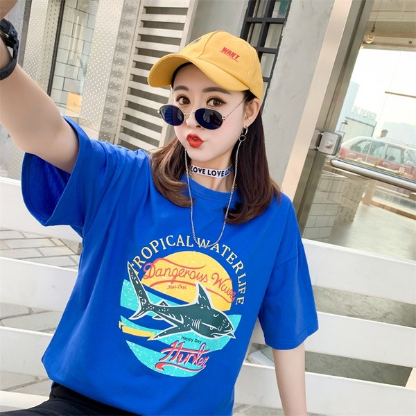 Modern női blúz rátéttel - széles modell