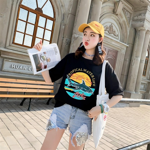 Modern női blúz rátéttel - széles modell