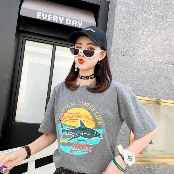 Modern női blúz rátéttel - széles modell