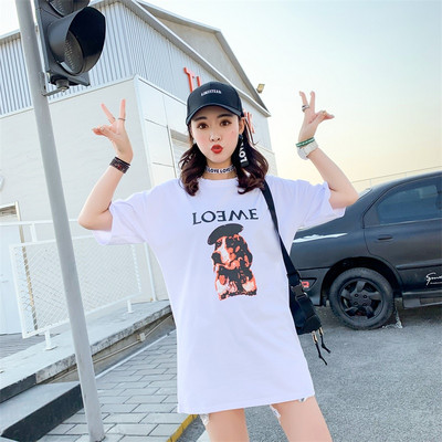 Aktuális női blúz hosszú modell rátéttel