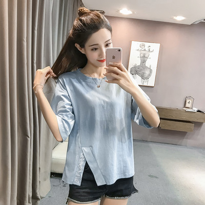 Μοντέρνα γυναικεία μπλούζα σε διάφορα χρώματα με σχισμή