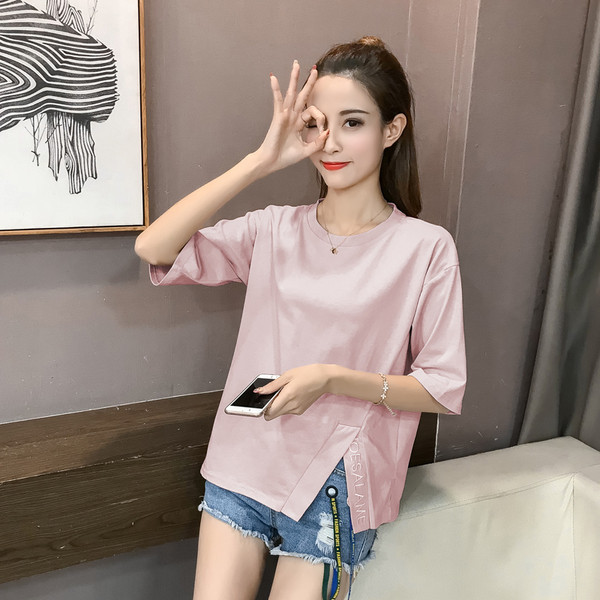 Μοντέρνα γυναικεία μπλούζα σε διάφορα χρώματα με σχισμή