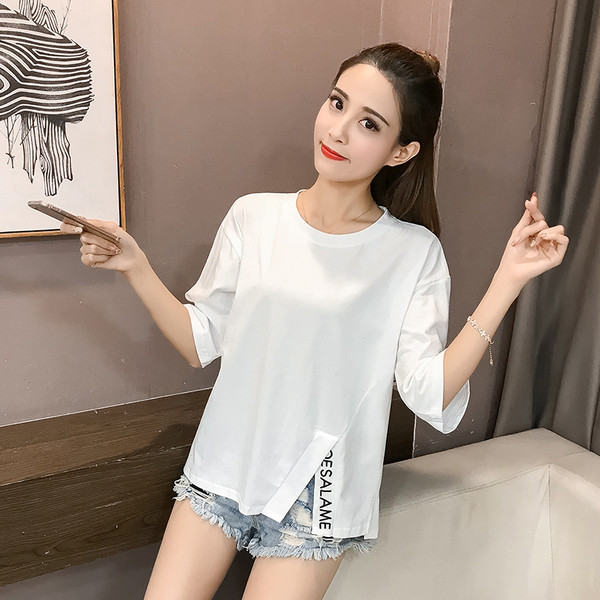 Μοντέρνα γυναικεία μπλούζα σε διάφορα χρώματα με σχισμή