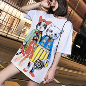 Fehér női topikus blúz, rátétekkel