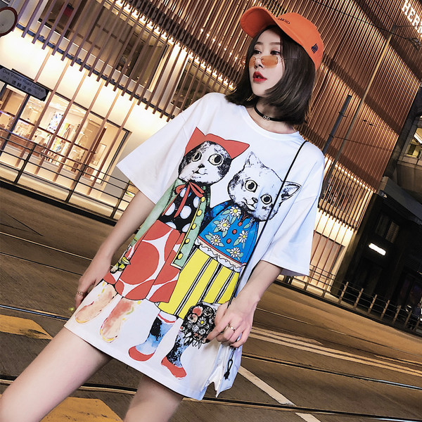 Fehér női topikus blúz, rátétekkel