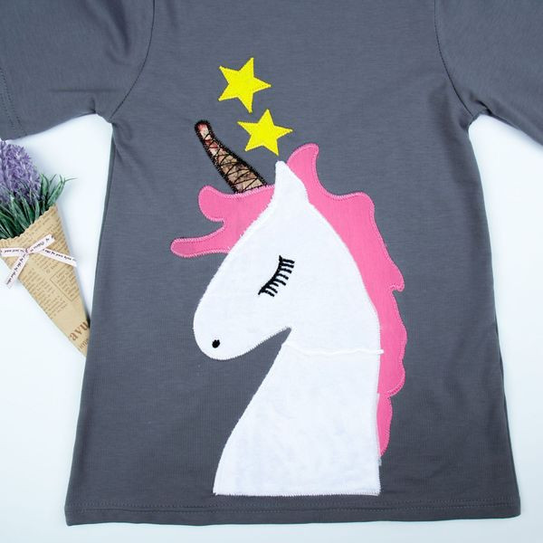 Korszerű gyerekpóló lányoknak szürke díszítéssel