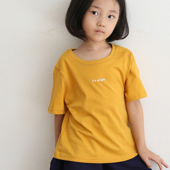 Παιδικό μπλουζάκι με επιγραφή σε μαύρο και κίτρινο χρώμα