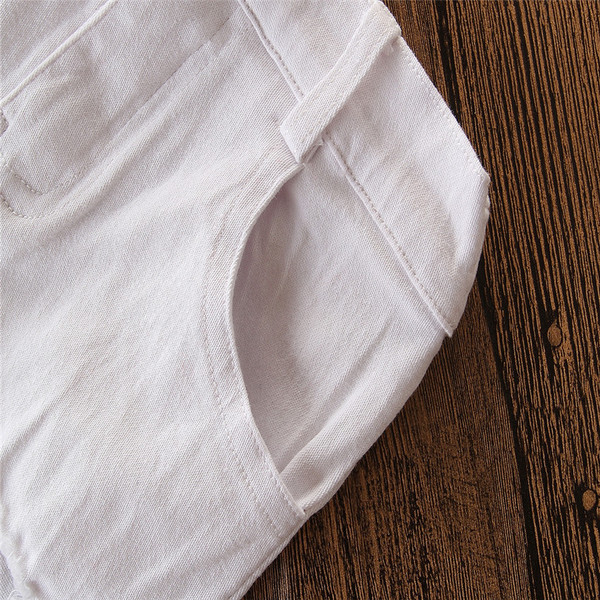 Gyerekkészlet lányoknak két részből áll - sárga blúz és szakadt motívumú nadrág