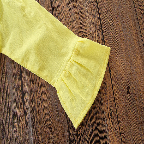 Gyerekkészlet lányoknak két részből áll - sárga blúz és szakadt motívumú nadrág