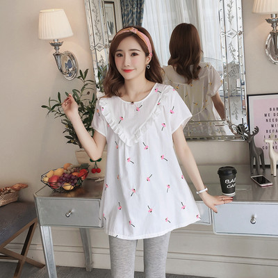 Стилна блуза за бременни жени в бял цвят с флорални мотиви