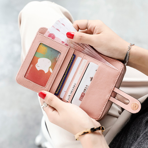 Модерен дамски портфейл в няколко цвята с цип