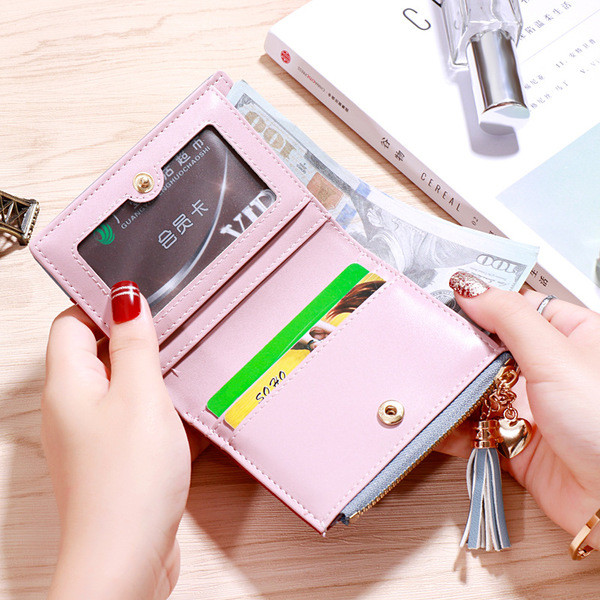 Модерен дамски портфейл в няколко цвята с пискюл